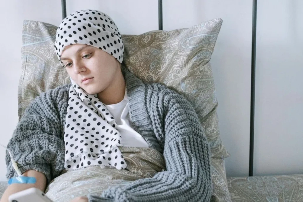 Patient resting in a hospital bed during medical care, representing epilepsy treatment and neurological support.